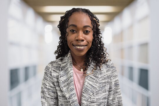 Professional headshot of Tia Carter